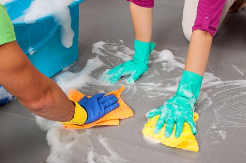 Carpet cleaning team preparing safe equipment and protective measures